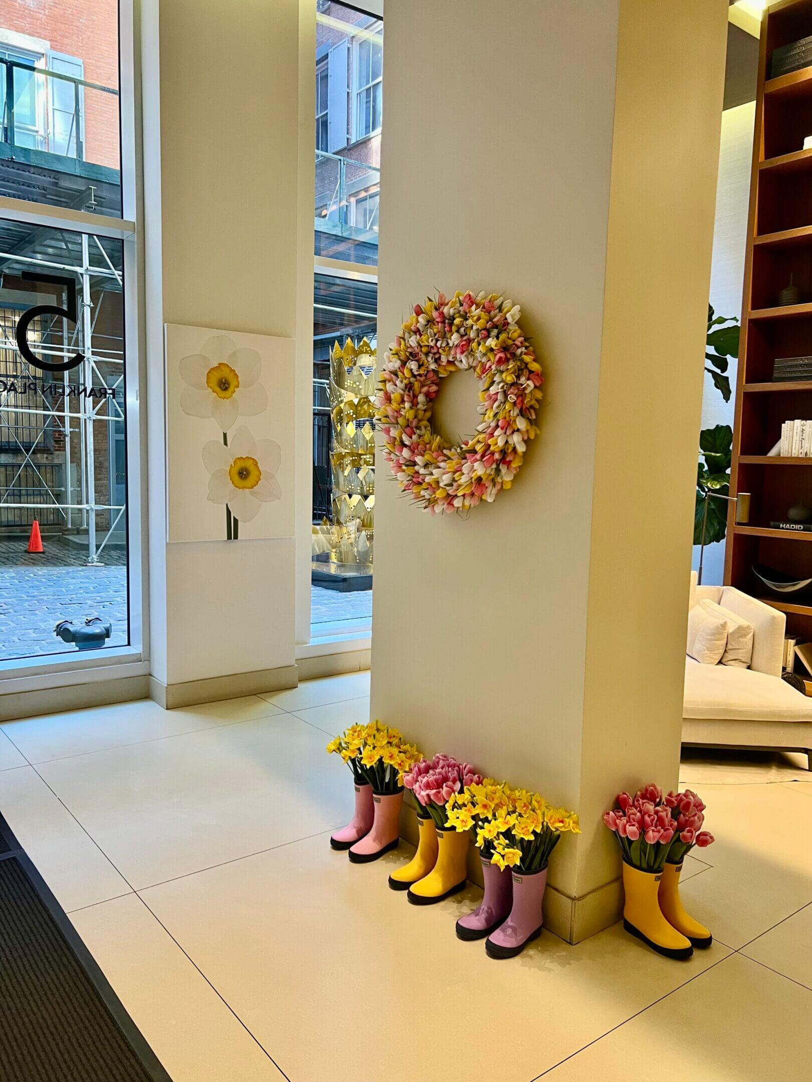 Spring flowers in boots and wreath.